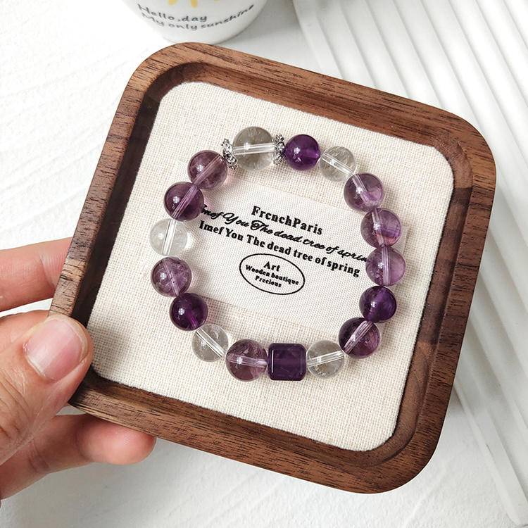 Purple apatite, amethyst, and clear quartz multi-gemstone bracelet promoting healing, balance, and positive energy.