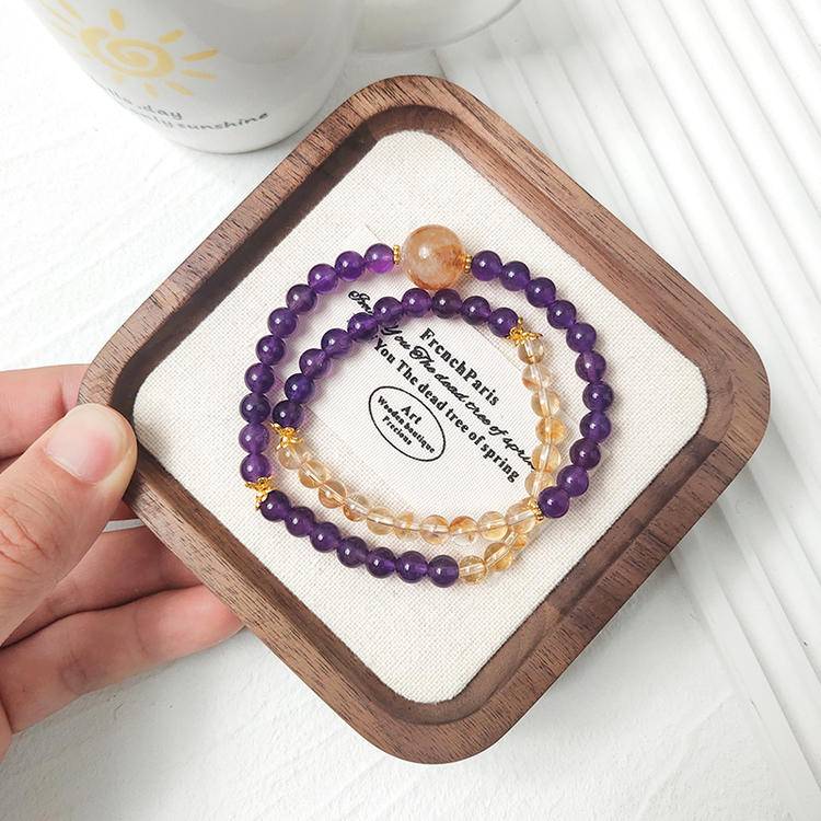 Double-strand multi-gem bracelet with amethyst and citrine, designed to enhance healing, balance, and positive energy.
