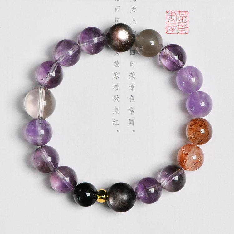 Healing five-elements bracelet featuring amethyst and obsidian for emotional well-being and energy balance.
