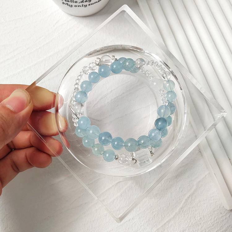 Healing bracelet featuring aquamarine and clear quartz for energy, balance, and emotional well-being.

