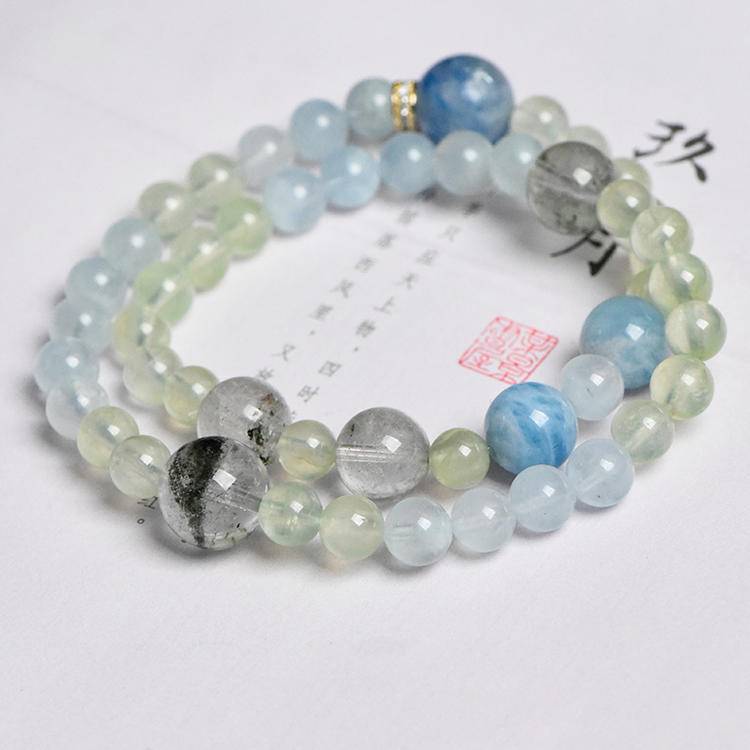 Aquamarine and green phantom quartz bracelet supporting emotional balance, energy, and positive intentions.