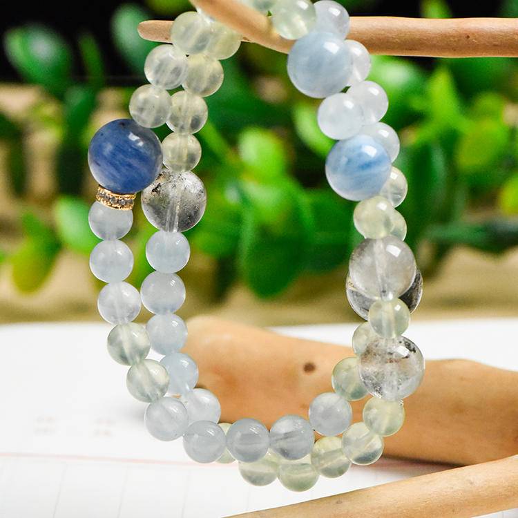 Healing bracelet featuring aquamarine and green phantom quartz for clarity, energy, and emotional well-being.