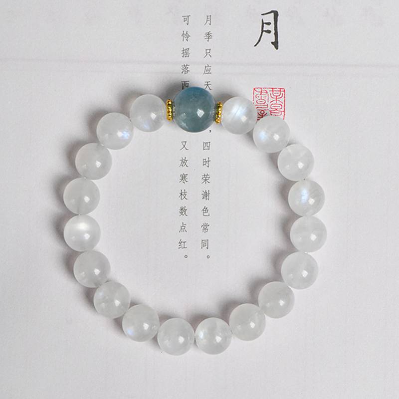 Healing multi-gem bracelet featuring aquamarine and moonstone for emotional balance and clarity.