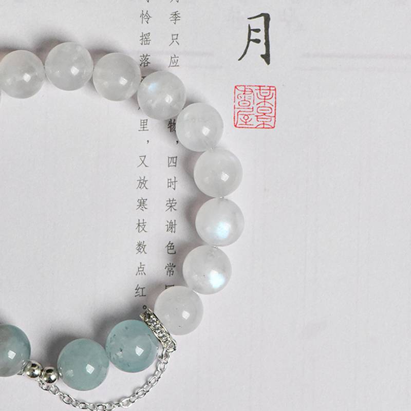 Healing multi-gem bracelet featuring aquamarine and moonstone for emotional balance and clarity.