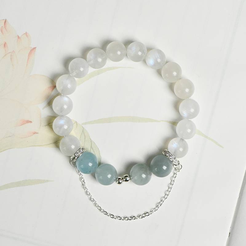 Multi-gem bracelet with aquamarine and moonstone designed to enhance intuitive clarity and positive energy.