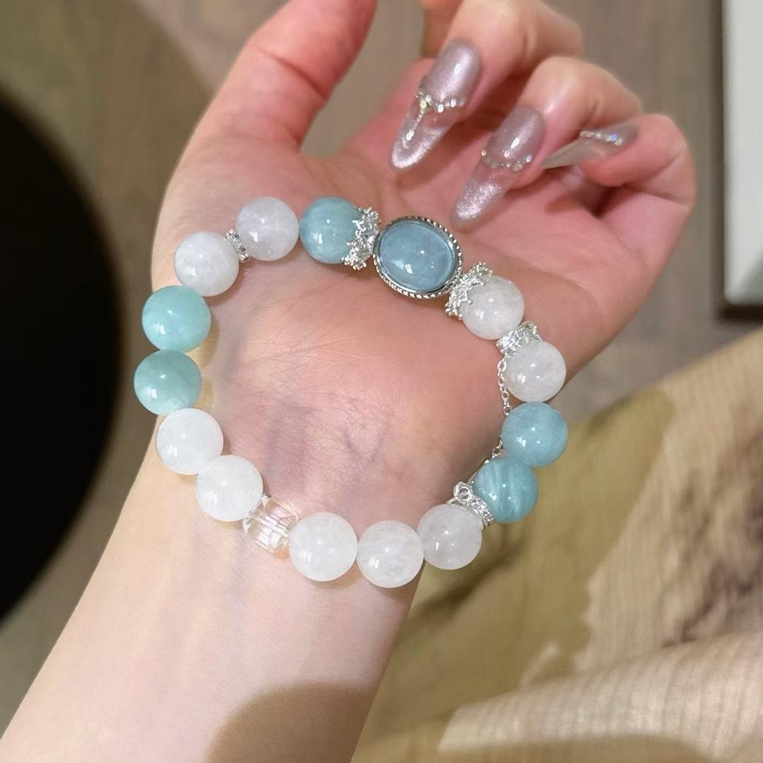 Multi-gem bracelet with aquamarine and white ghost quartz designed to enhance clarity, energy, and healing.