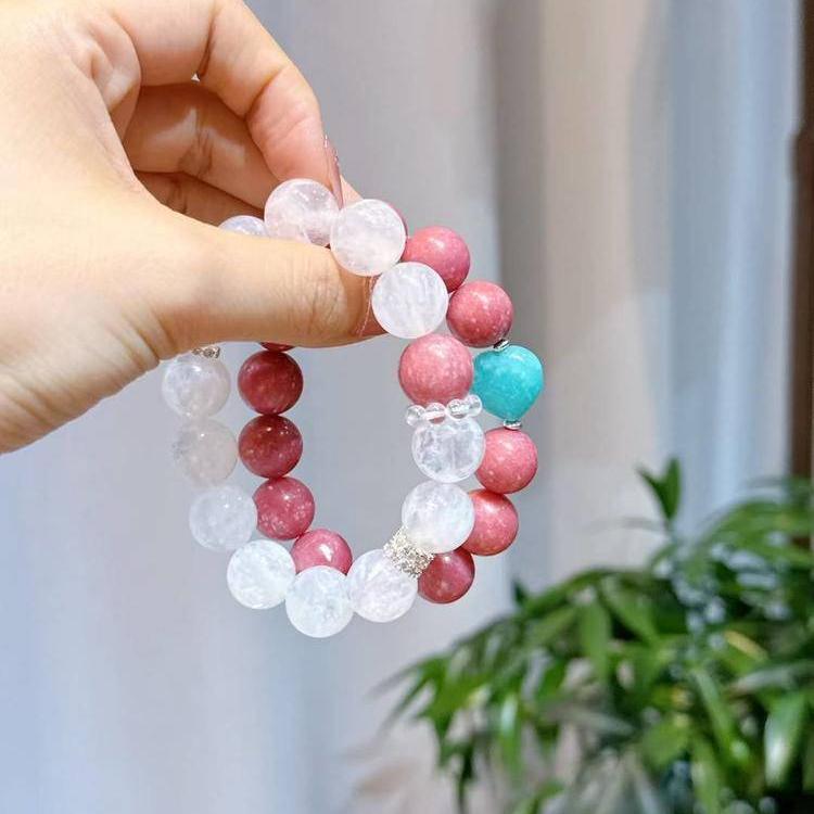 Layered bracelet set with rhodochrosite and snow phantom quartz for love and healing energy.