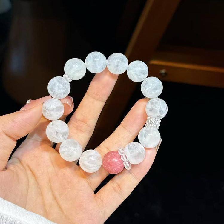 Healing bracelet set featuring rhodochrosite and snow phantom quartz for positivity and calmness.
