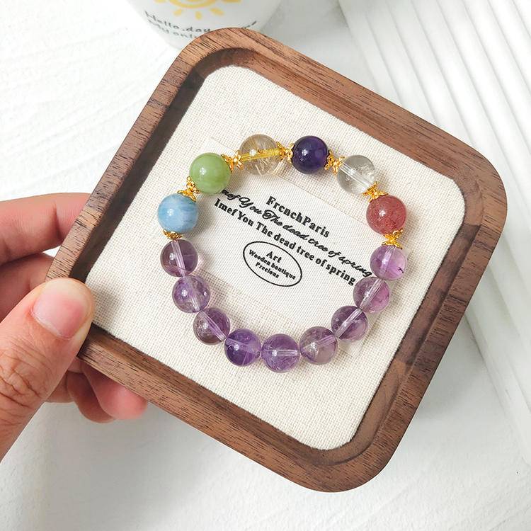 Brazil amethyst and clear quartz bracelet with fluorite and aquamarine, promoting emotional balance, healing, and positive energy.
