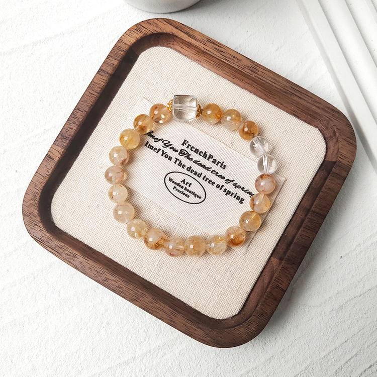 Citrine and clear quartz tower bracelet promoting healing, energy, and positive intentions.