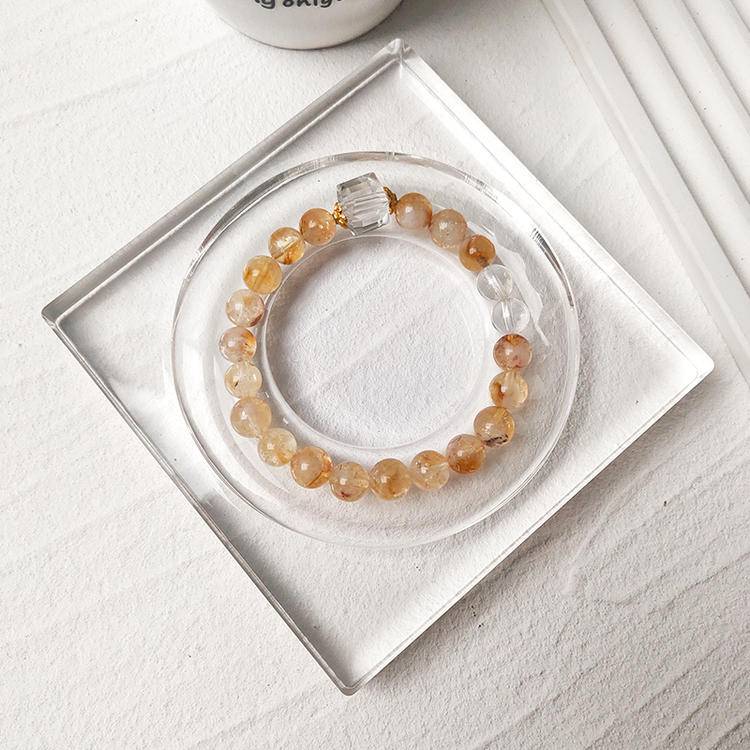 Multi-gem bracelet with citrine and clear quartz designed to enhance healing, focus, and positive energy.