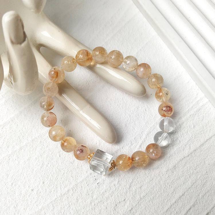 Healing bracelet featuring citrine and clear quartz for clarity, energy, and emotional well-being.
