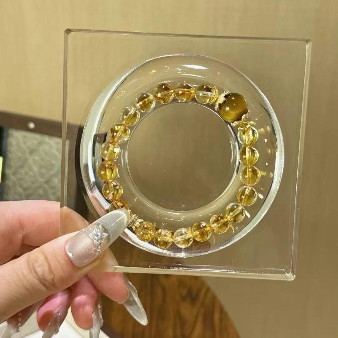 Citrine and yellow tiger's eye bracelet supporting emotional balance, energy, and positive intentions.