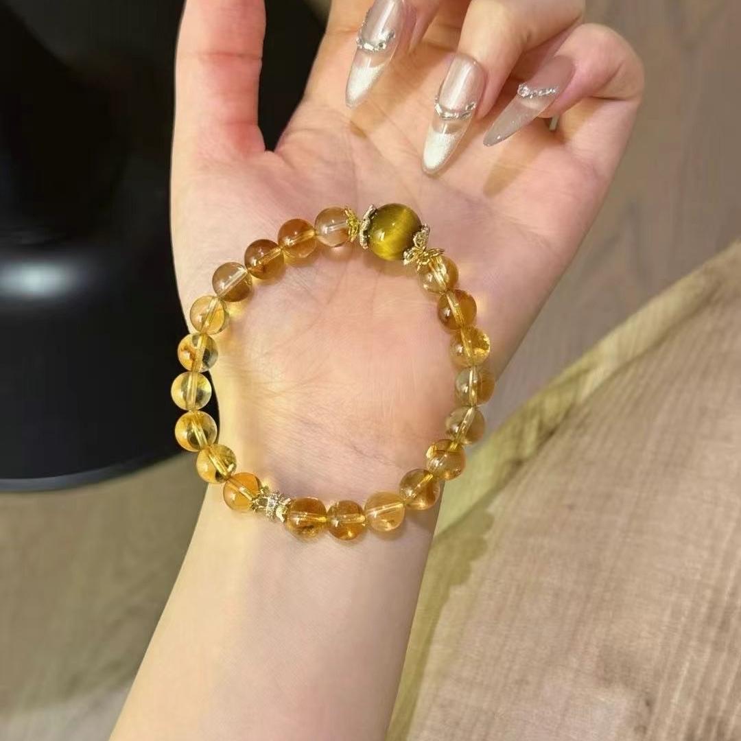 Healing bracelet featuring citrine and yellow tiger's eye for clarity, energy, and emotional well-being.