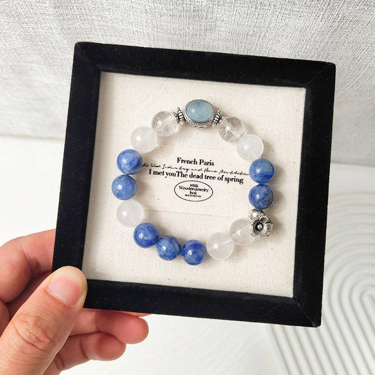 Multi-gemstone bracelet with clear quartz, blue crystal, and aquamarine set in alloy magic box, designed to enhance healing, balance, and positive energy.
