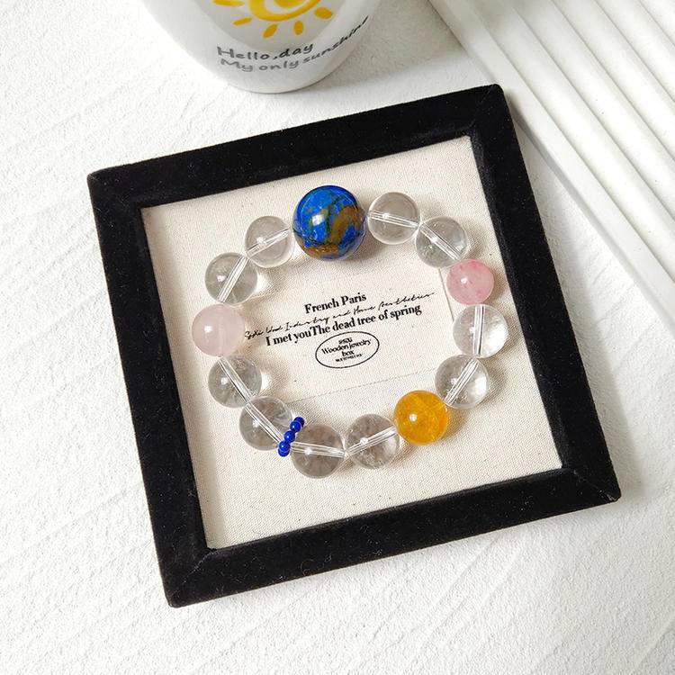 Healing multi-gemstone bracelet featuring clear quartz for emotional well-being and energy balance.
