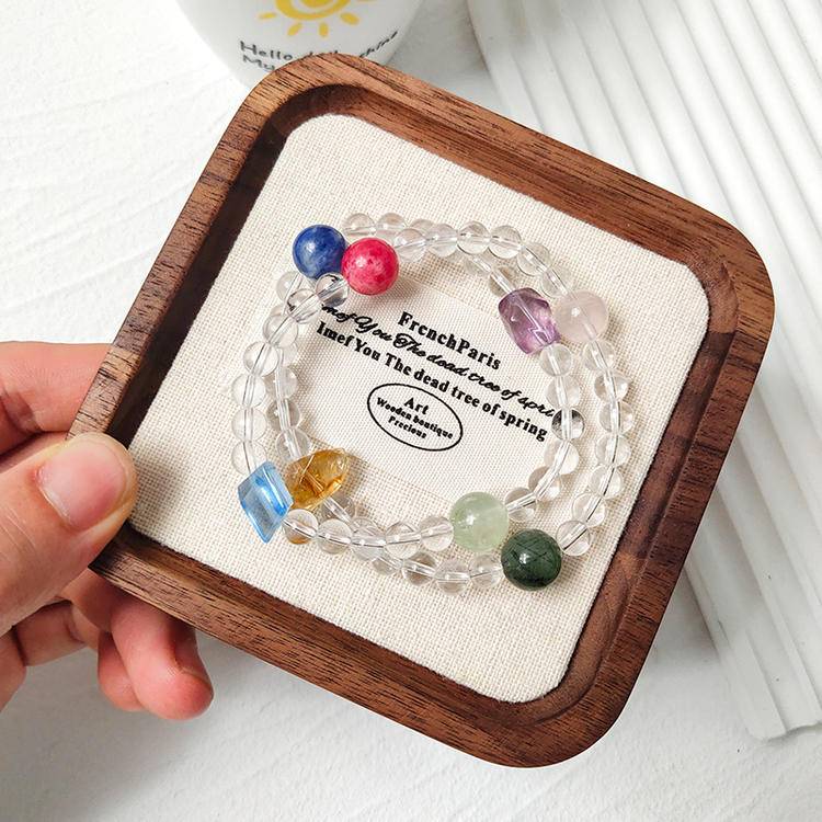 Healing double-wrap bracelet featuring clear quartz and multiple gemstones for emotional well-being and energy balance.
