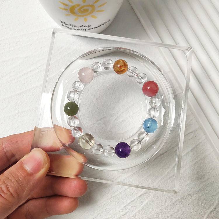 Clear quartz and multi-gemstone bracelet including rose quartz, yellow tiger quartz, pink salt stone, aquamarine, amethyst, citrine, and Hetian jade, promoting emotional balance, healing, and positive energy.
