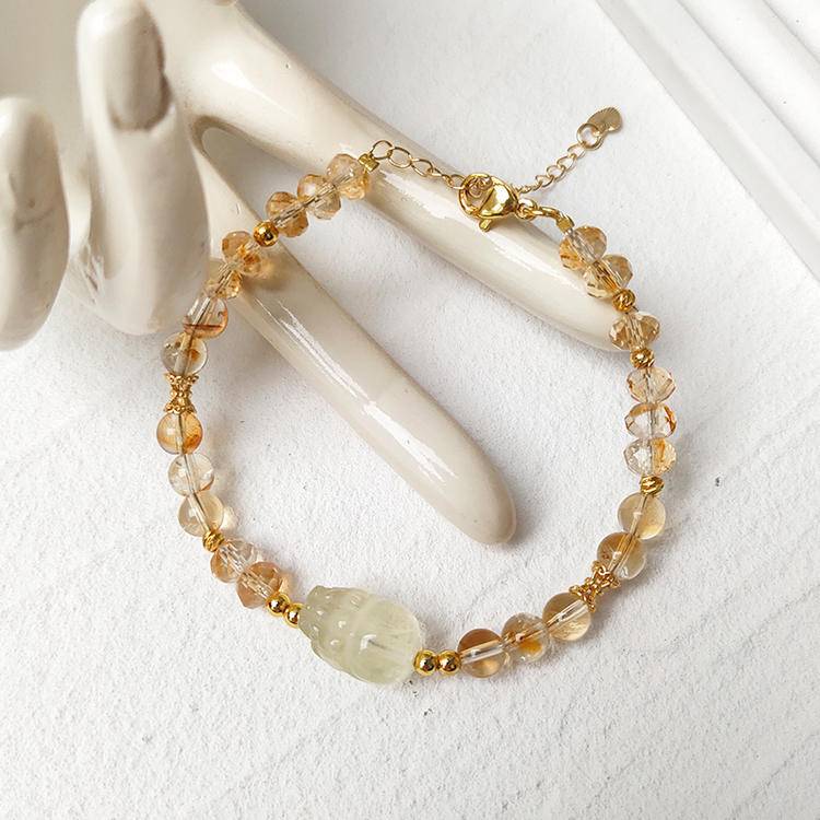 Healing bracelet featuring faceted citrine and Pi Xiu for energy, clarity, and prosperity.