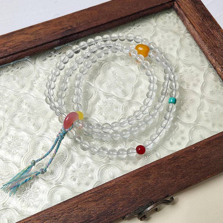 108-bead prayer beads with nanhong agate, butterscotch amber, and clear quartz, designed to enhance focus, healing, and positive energy.

