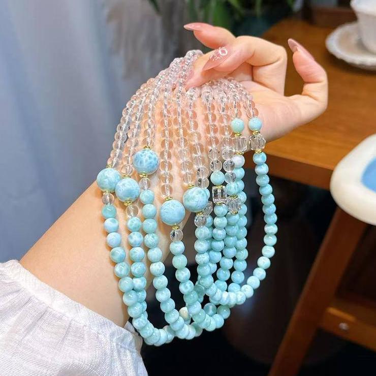 Larimar and clear quartz double-strand bracelet for calmness, healing, and emotional balance.