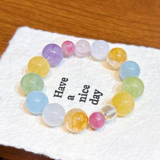 Rhodochrosite and aquamarine healing bracelet bringing balance, love, and emotional stability.