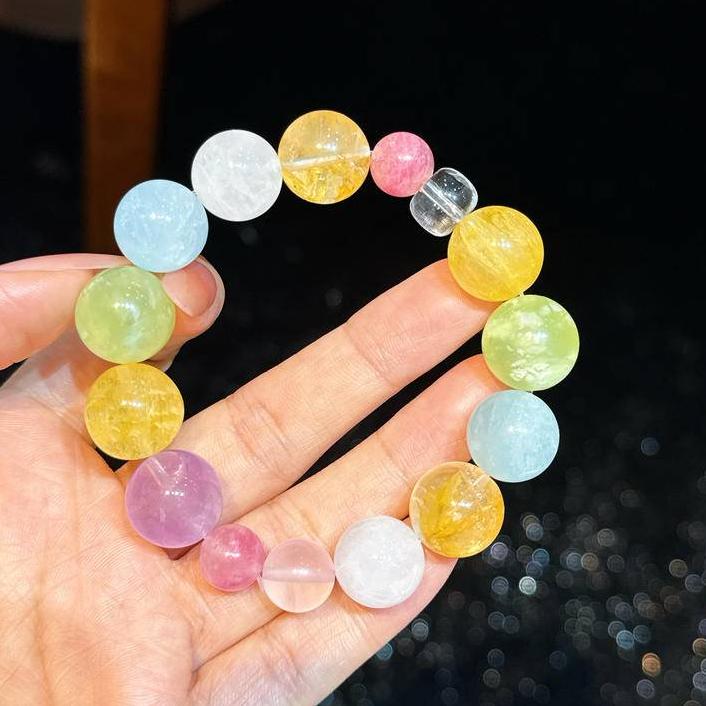 Elegant gemstone bracelet with rhodochrosite and aquamarine for calmness and inner strength.