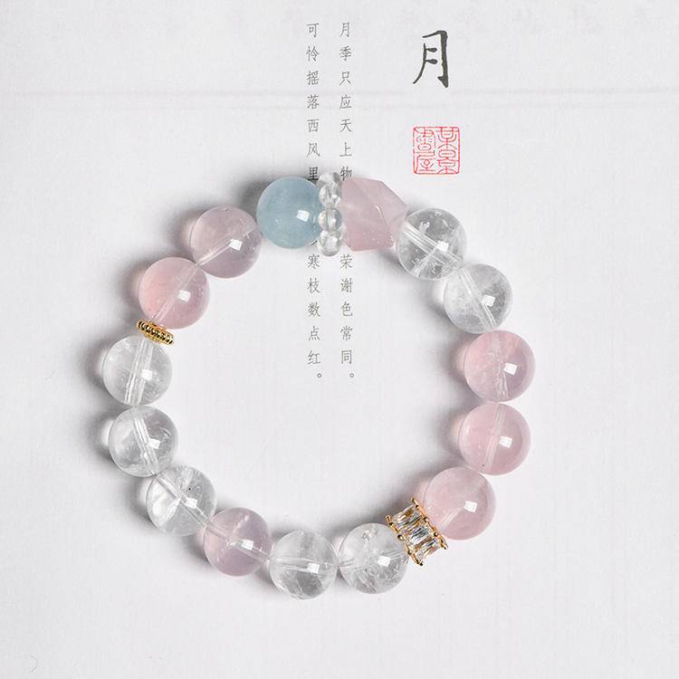 Rose quartz, aquamarine, and clear quartz multi-gemstone bracelet promoting healing, balance, and positive energy.