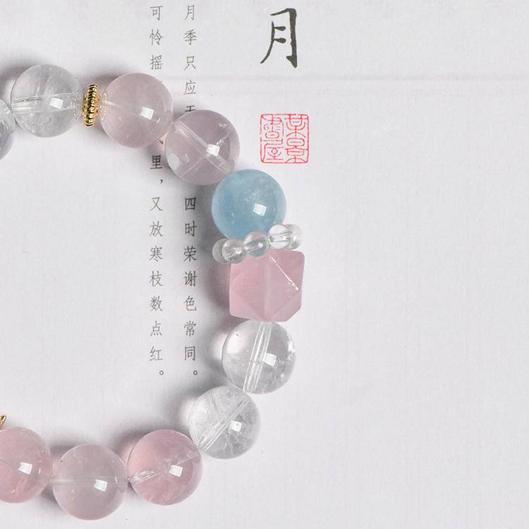 Multi-gem bracelet with rose quartz, aquamarine, and clear quartz, designed to enhance healing, balance, and positive energy.