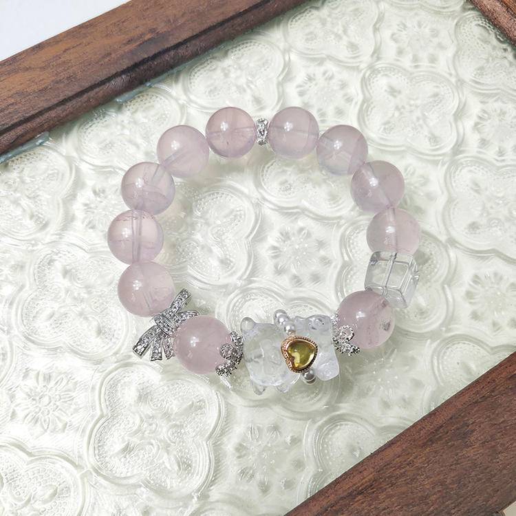 Rose quartz bear bracelet supporting emotional balance, positive energy, and healing.