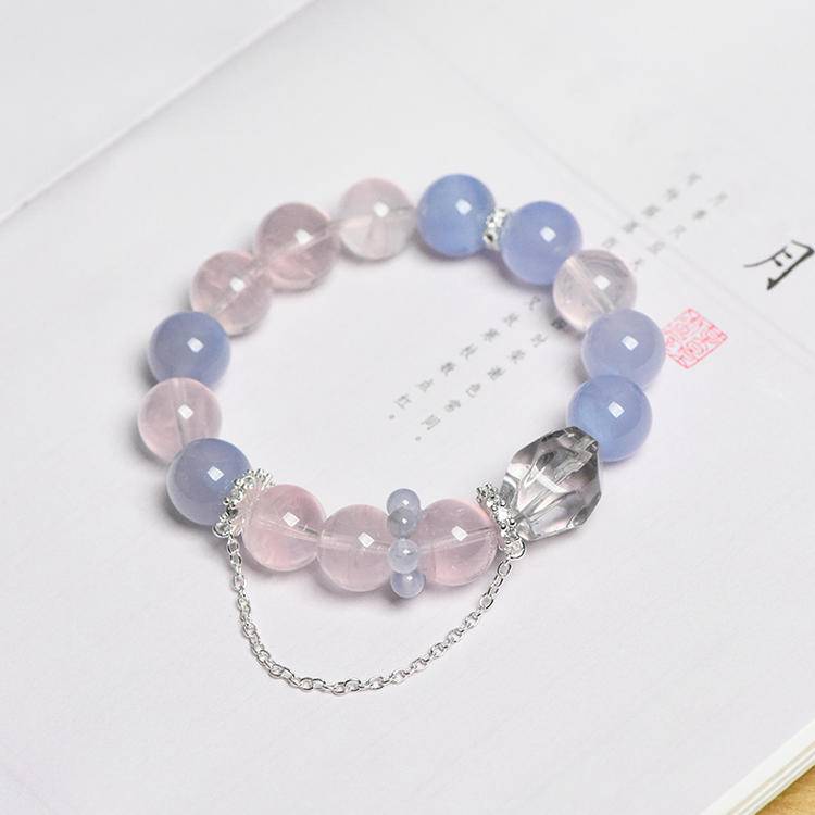 Rose quartz and blue vein agate multi-gem bracelet promoting healing, balance, and positive energy.