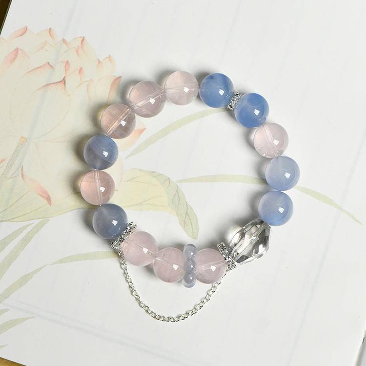 Rose quartz and blue vein agate bracelet supporting emotional balance, positive energy, and healing.