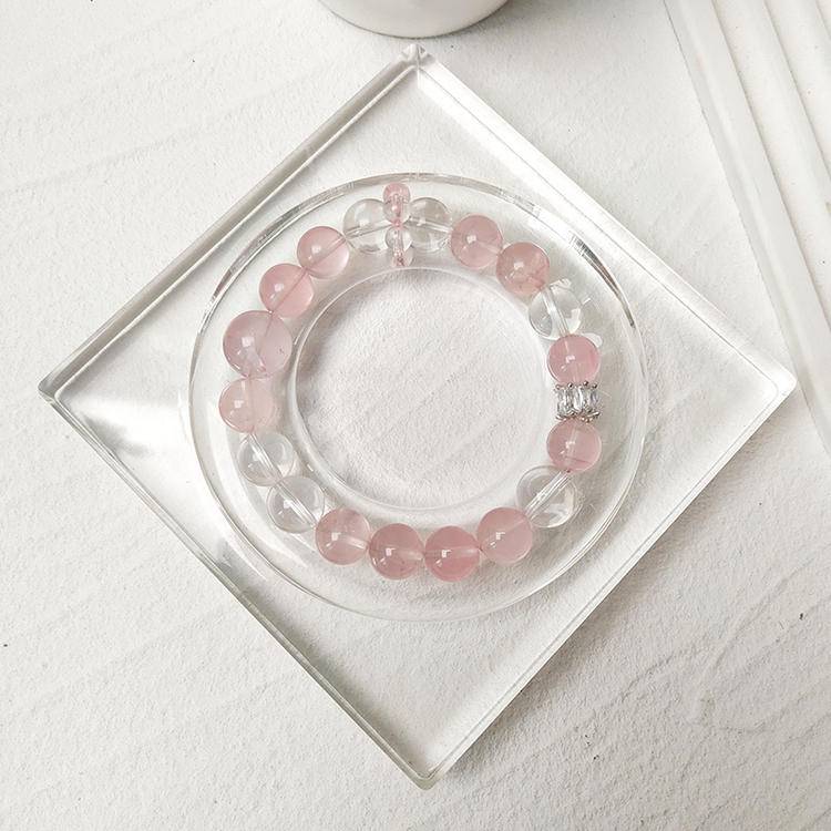 Rose quartz and clear quartz multi-gemstone bracelet designed to promote healing, balance, and positive energy.
