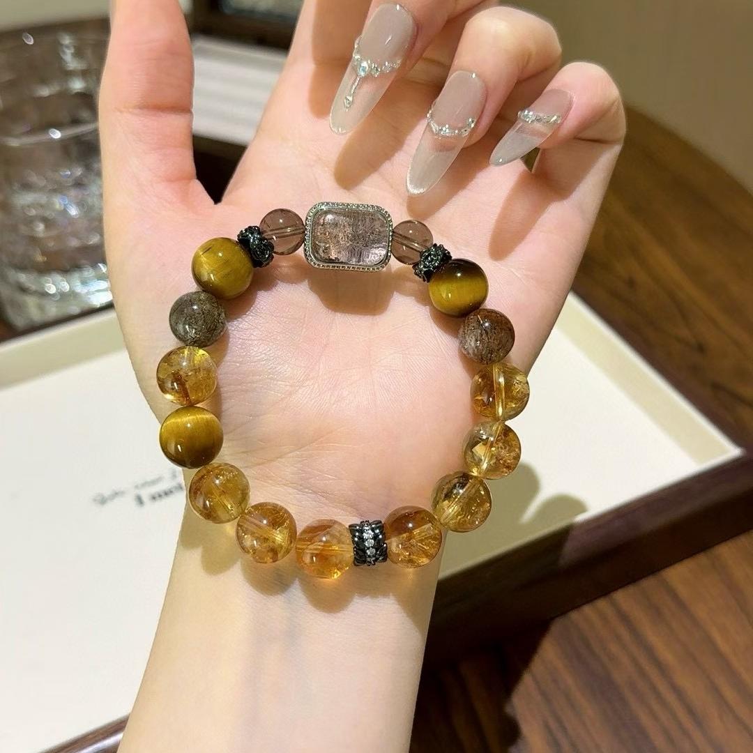 Tiger eye and citrine multi-gemstone bracelet designed to promote healing, balance, and positive energy.