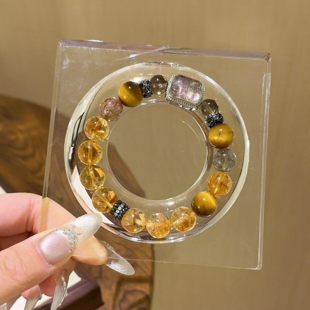 Tiger eye and citrine healing bracelet promoting energy, balance, and positive intentions.