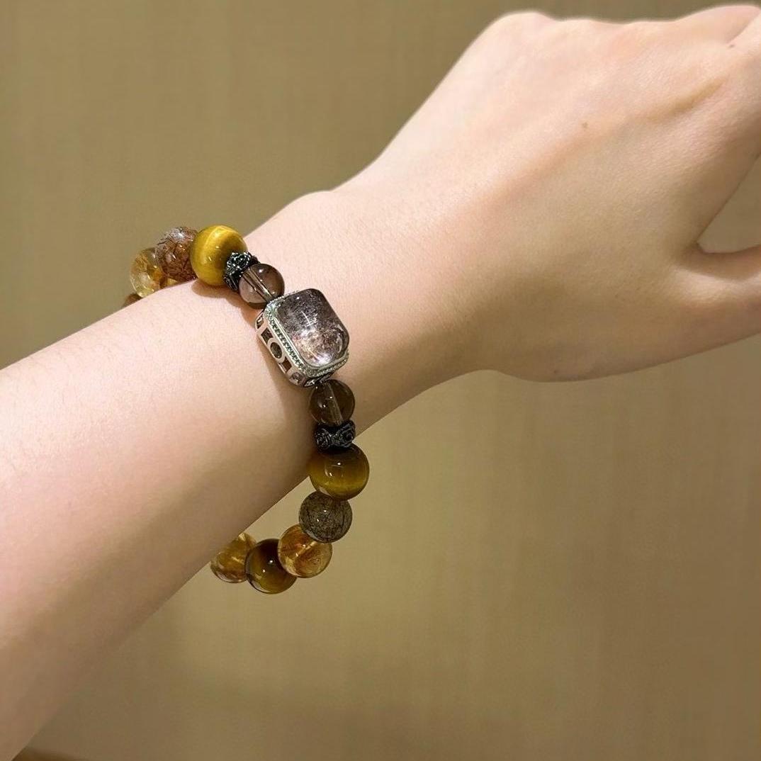 Healing bracelet featuring tiger eye and citrine for grounding, clarity, and emotional well-being.