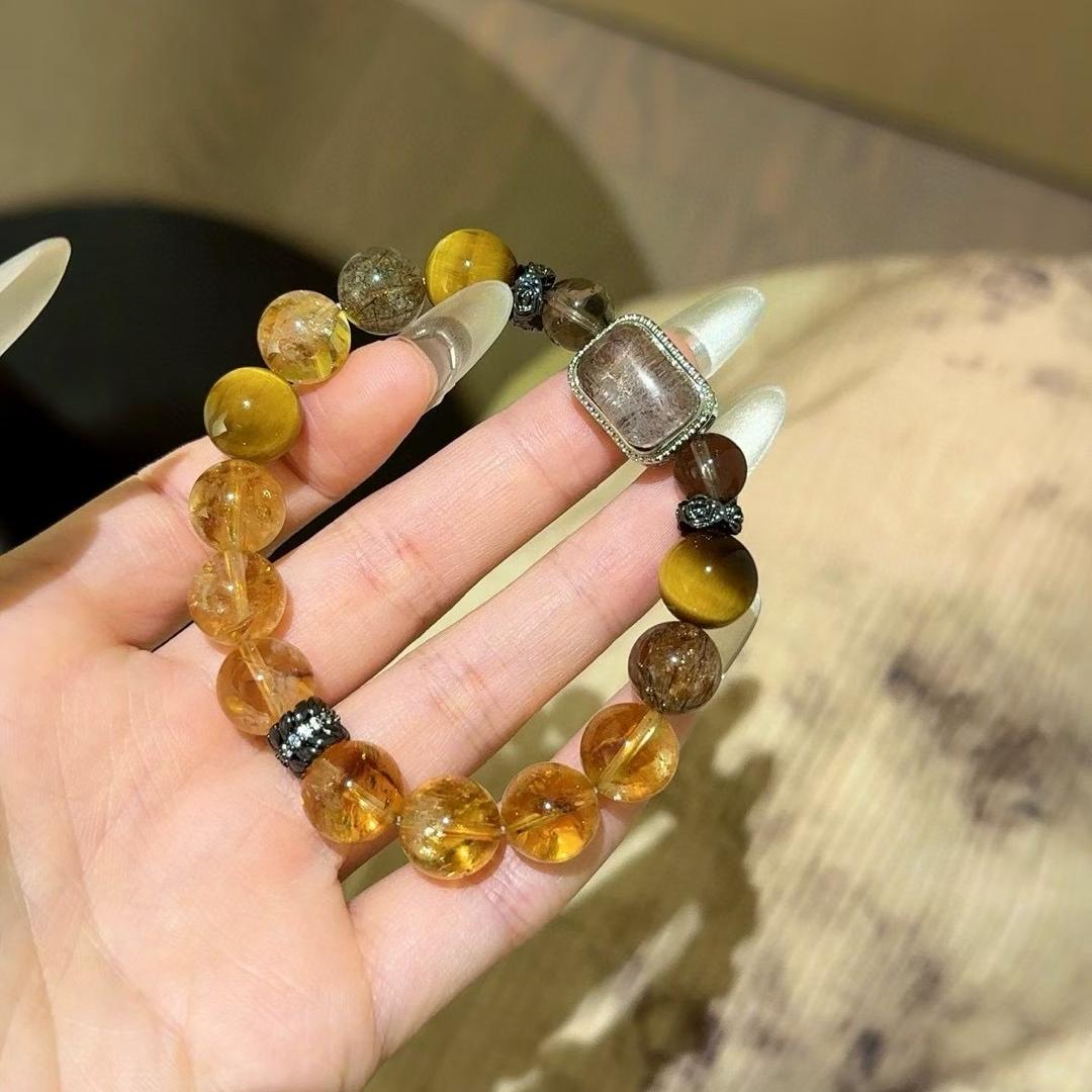 Healing multi-gem bracelet featuring tiger eye and citrine for emotional well-being and mental clarity.