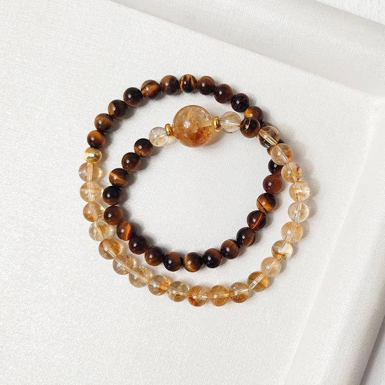 Healing bracelet featuring tiger eye and citrine tower for energy, clarity, and protection.