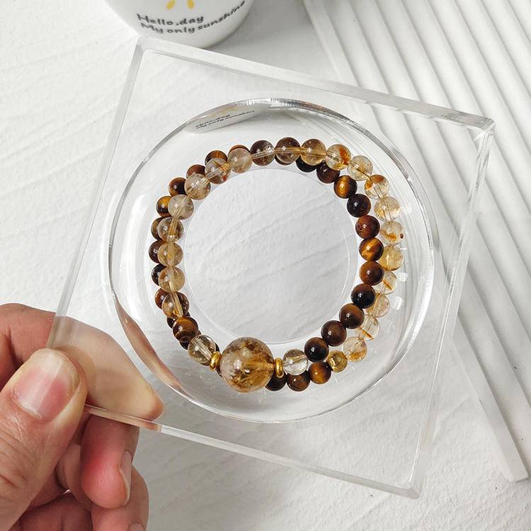 Tiger eye and citrine multi-gemstone bracelet designed to promote healing, balance, and positive energy.